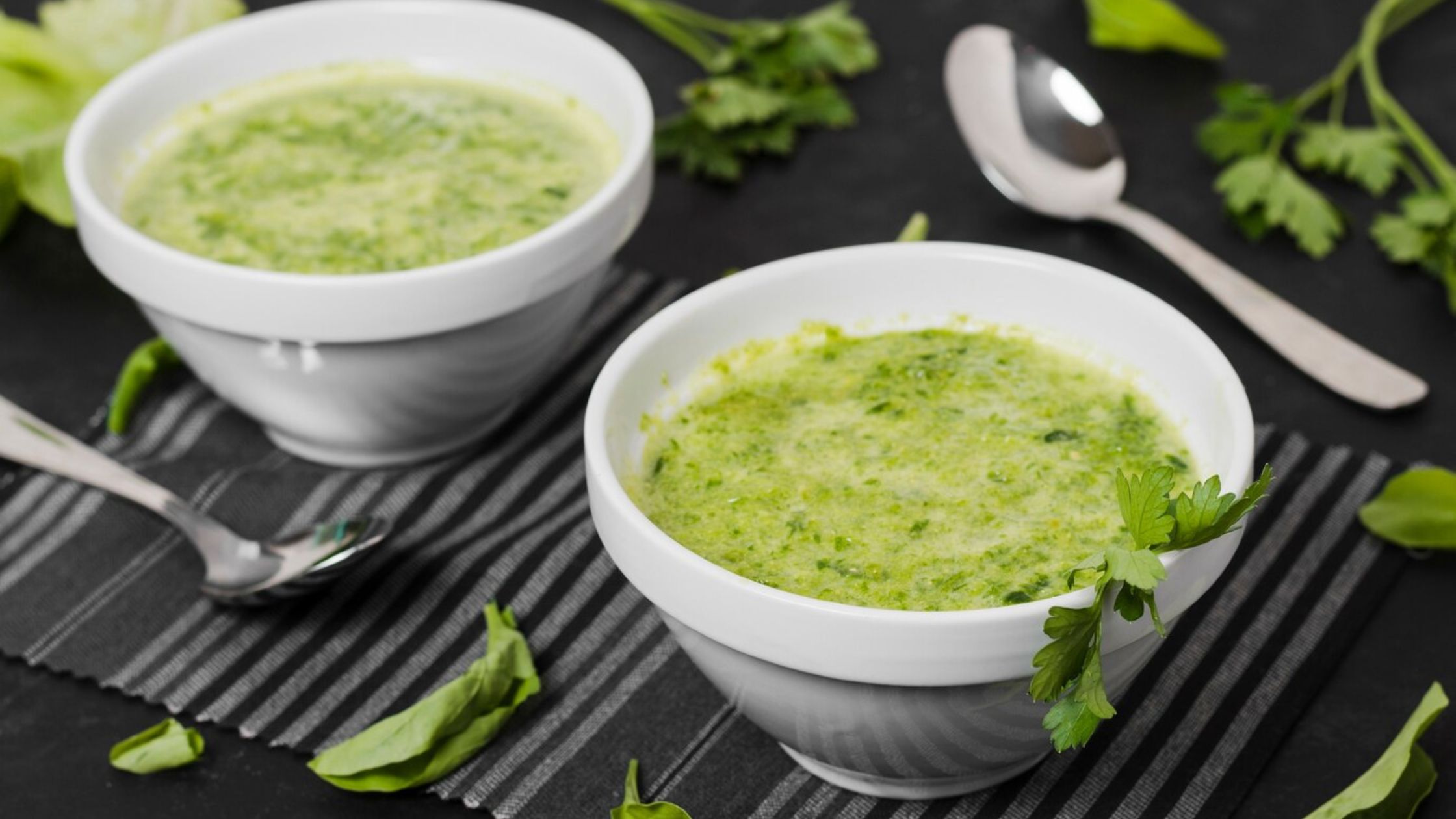 A picture of soup bowls with parsley